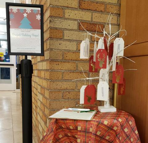 Photo of holiday hope tree in library