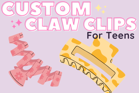 Custom Claw Clips in white text with two claw clips pictured - one in pink and one with a cow design in yellow.