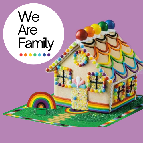 Gingerbread house with We Are Family text