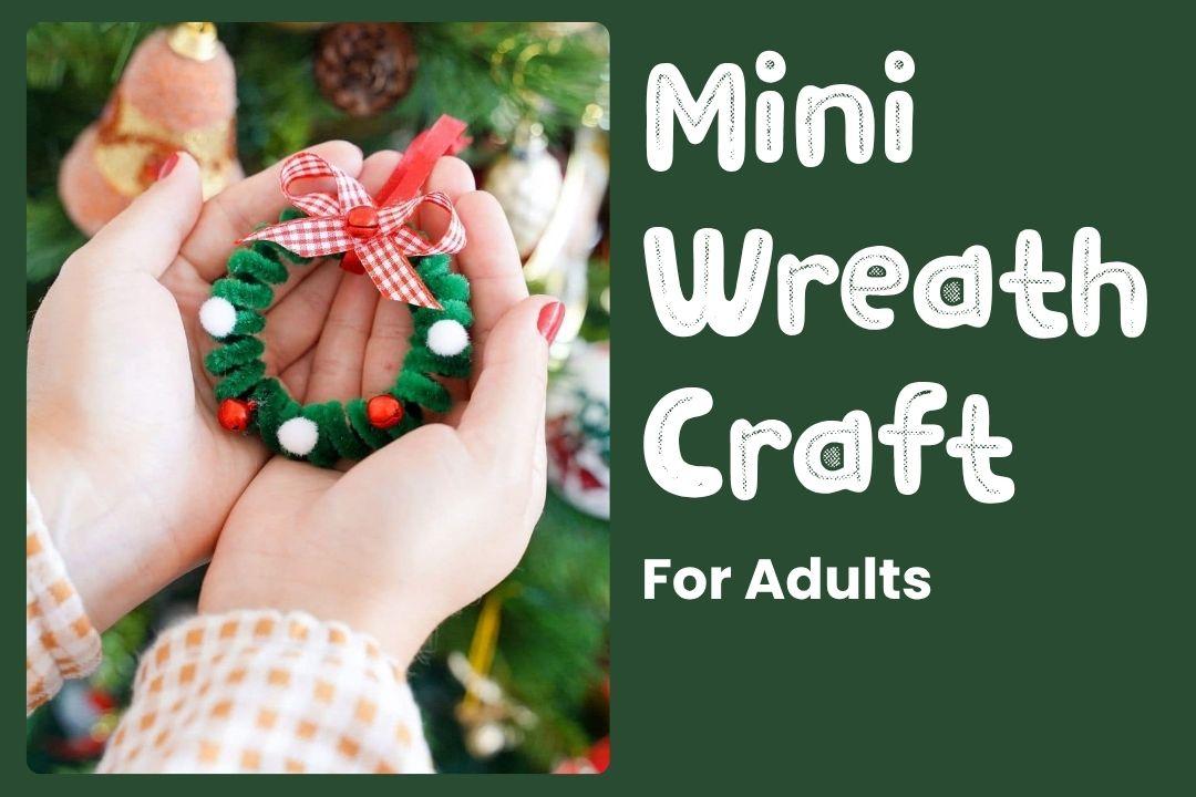 Two hands holding a mini wreath